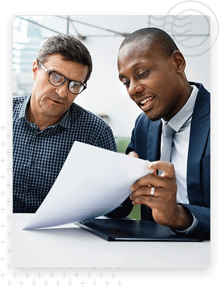 Professionals reviewing a document together